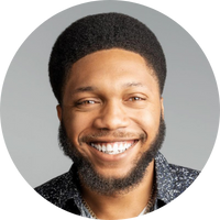 A headshot photograph of Paul Bailey, Executive Director of Black Health Alliance